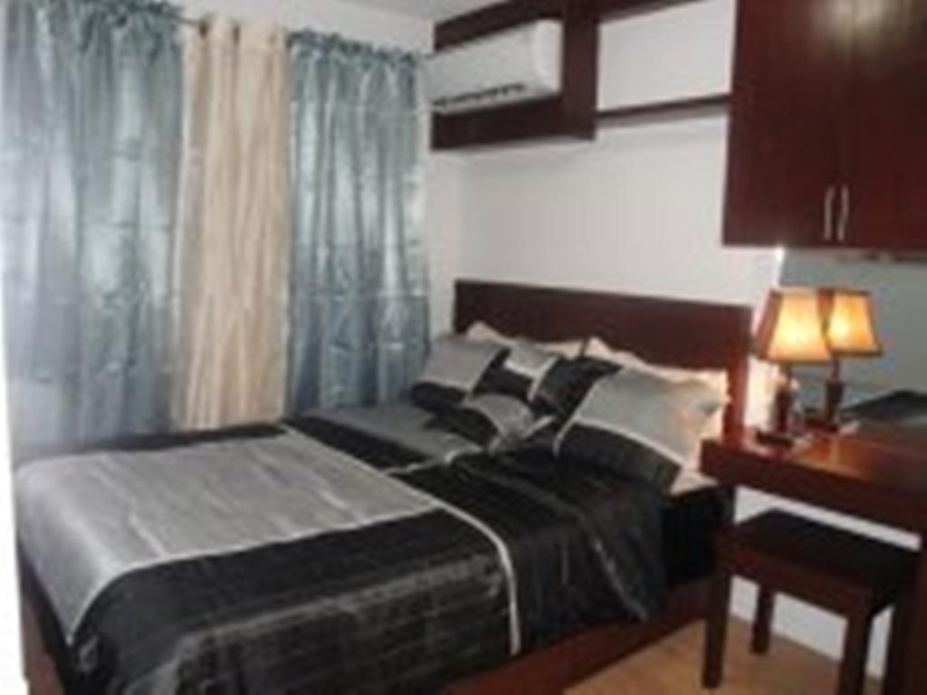 The Oasis Davao Condotel Rum bild